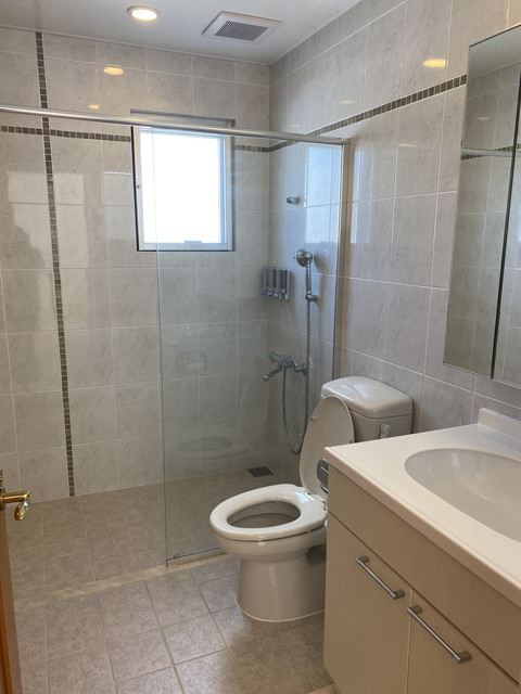 Single house in front of Awase sea wall