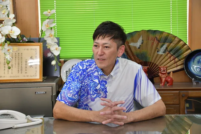 代表 宜野座 嗣浩